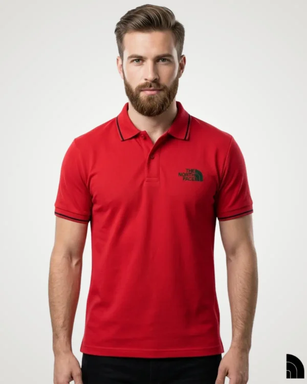 Men's vibrant red short-sleeve polo shirt with black striped tipping on the collar and cuffs, featuring a subtle embroidered chest logo by Signature Lifestyle