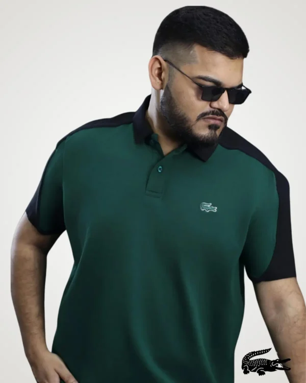 Men's bottle green polo shirt designed with a black collar and contrasting black sleeve panels by Signature Lifestyle