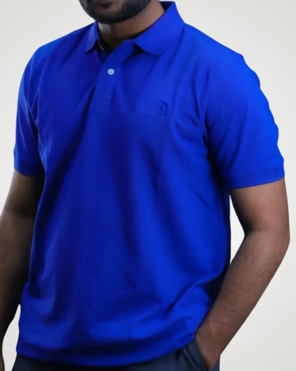 Men's vibrant royal blue short-sleeve polo shirt with tonally embroidered chest logo by Signature Lifestyle