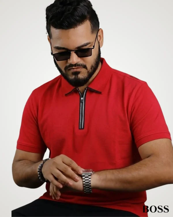 Vibrant red 240 GSM cotton blend polo t-shirt for men, designed with a black zip placket and short sleeves.