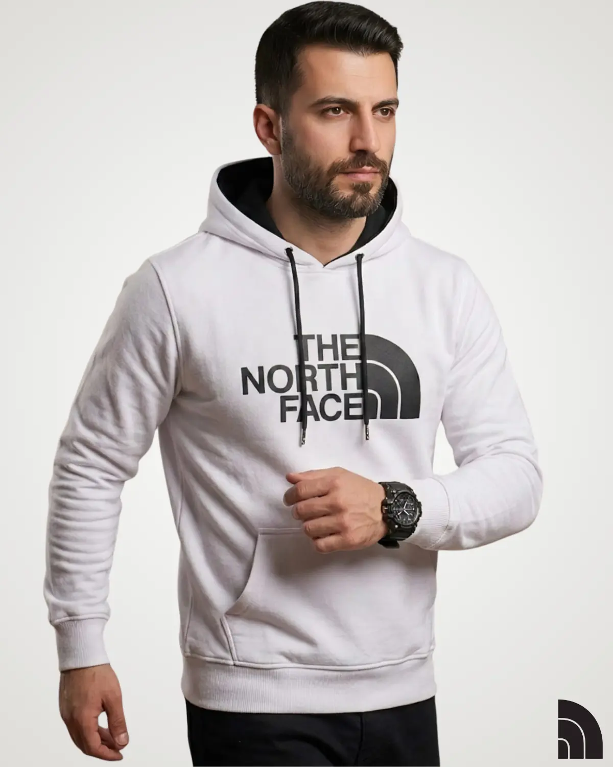 Clean front view of a man wearing a bright white classic mens hoodie with a high-contrast black typography print on the chest, dark inner hood lining, and black drawstrings.
