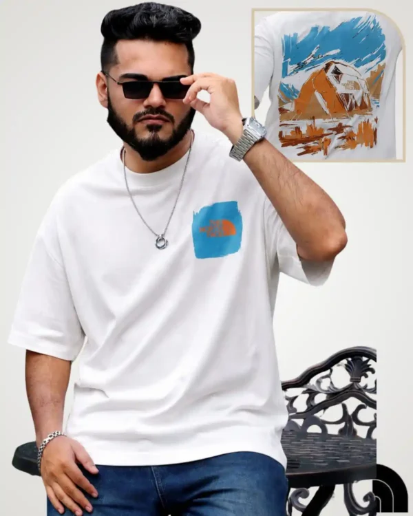 White men's drop shoulder t-shirt with orange chest patch and artistic tent graphic back print by Signature Lifestyle