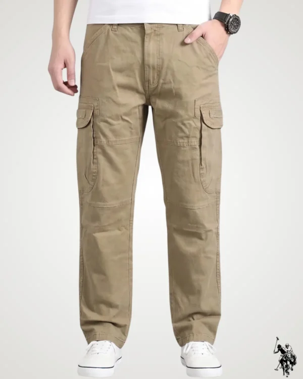 Front view of a model wearing khaki brown streetwear six pocket cargo pants with side utility flap pockets, waistband belt loops, and a comfortable regular fit