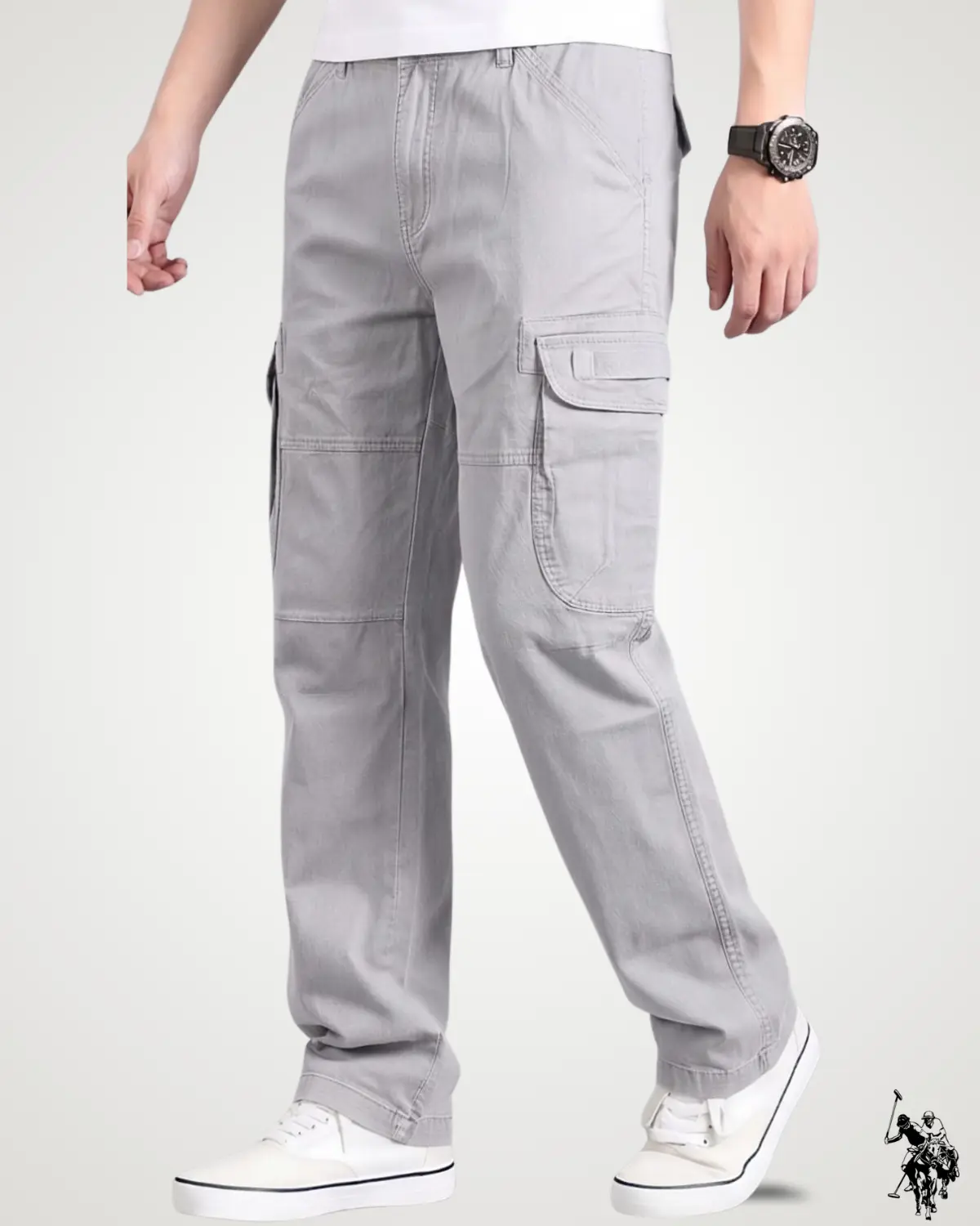 Side angled view of a model in light grey streetwear six pocket cargo pants, styled with white casual shoes, featuring side flap utility pockets and clean stitching details.