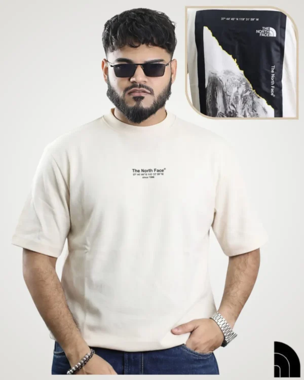 Off-white vintage t-shirt for men with coordinate chest print and torn-paper mountain back graphic – Signature Lifestyle BD